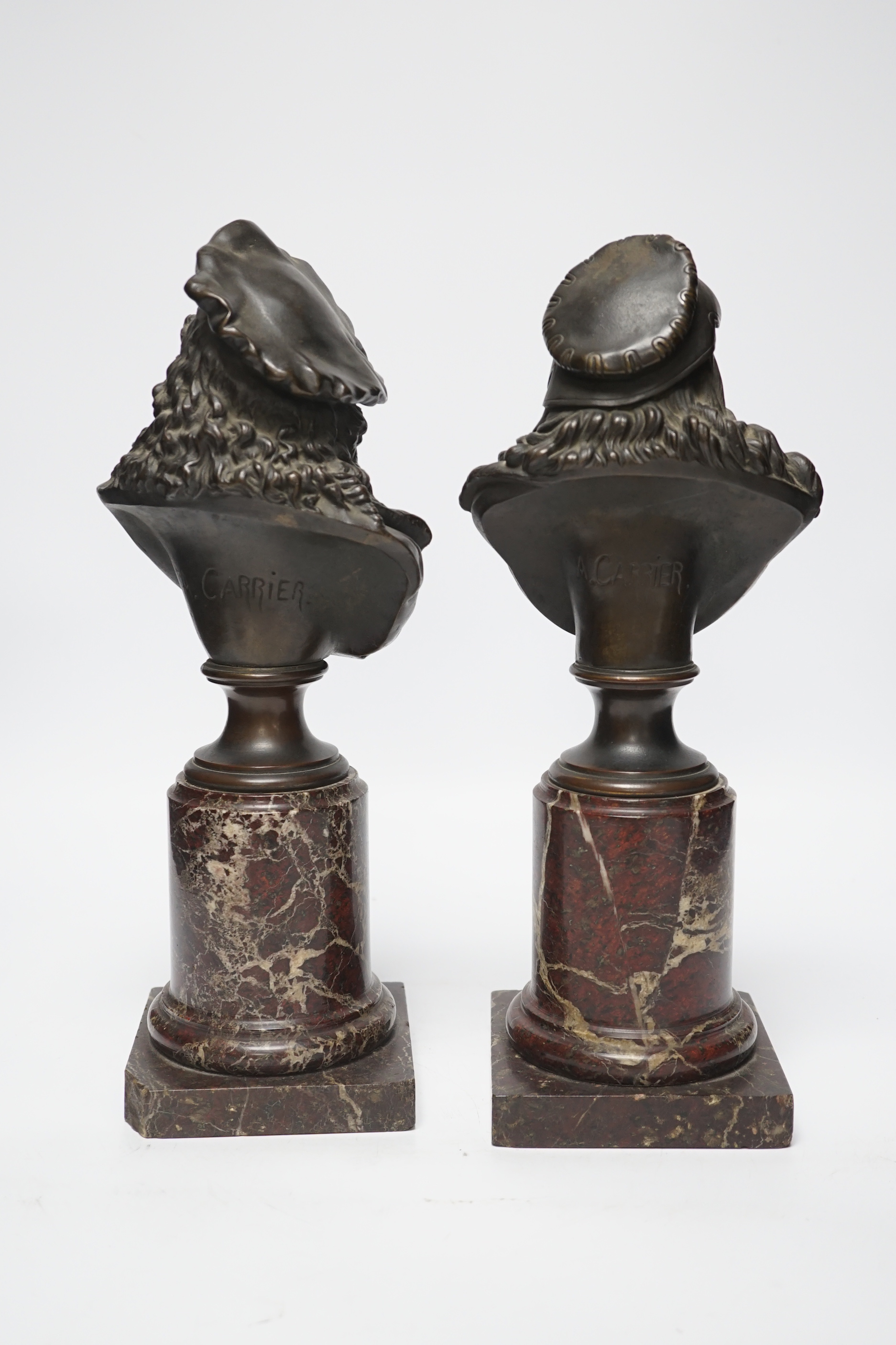 Albert-Ernest Carrier-Belleuse (1824-1887). A pair of late 19th century busts of the artists Albrecht Durer and Rembrandt, on marble columns, 33cm